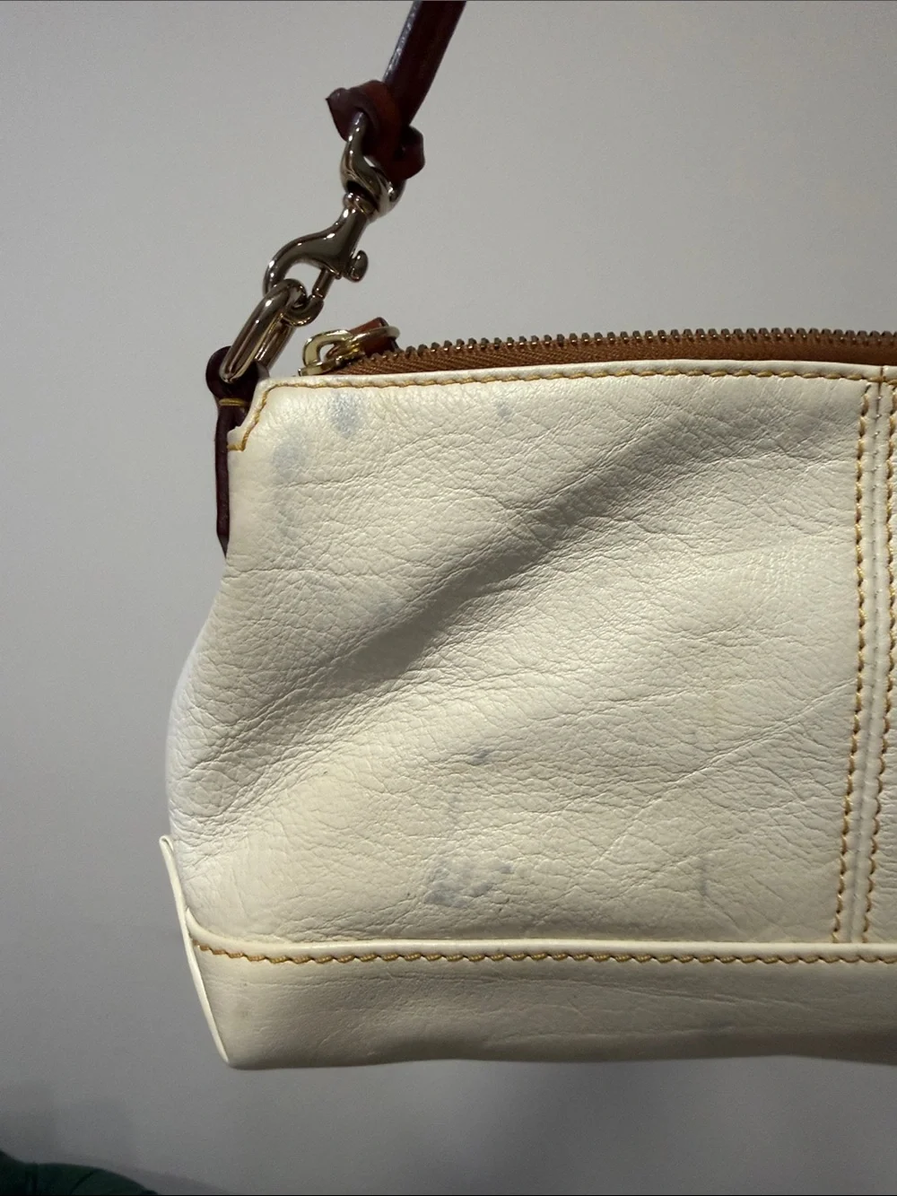 Dooney & Bourke Cream Leather Wristlet with Brown Trim - Sleek Everyday Clutch